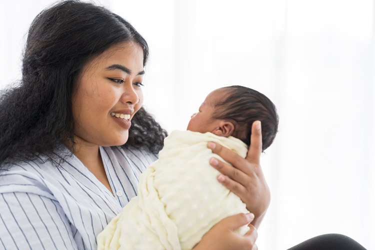 Mom holding baby