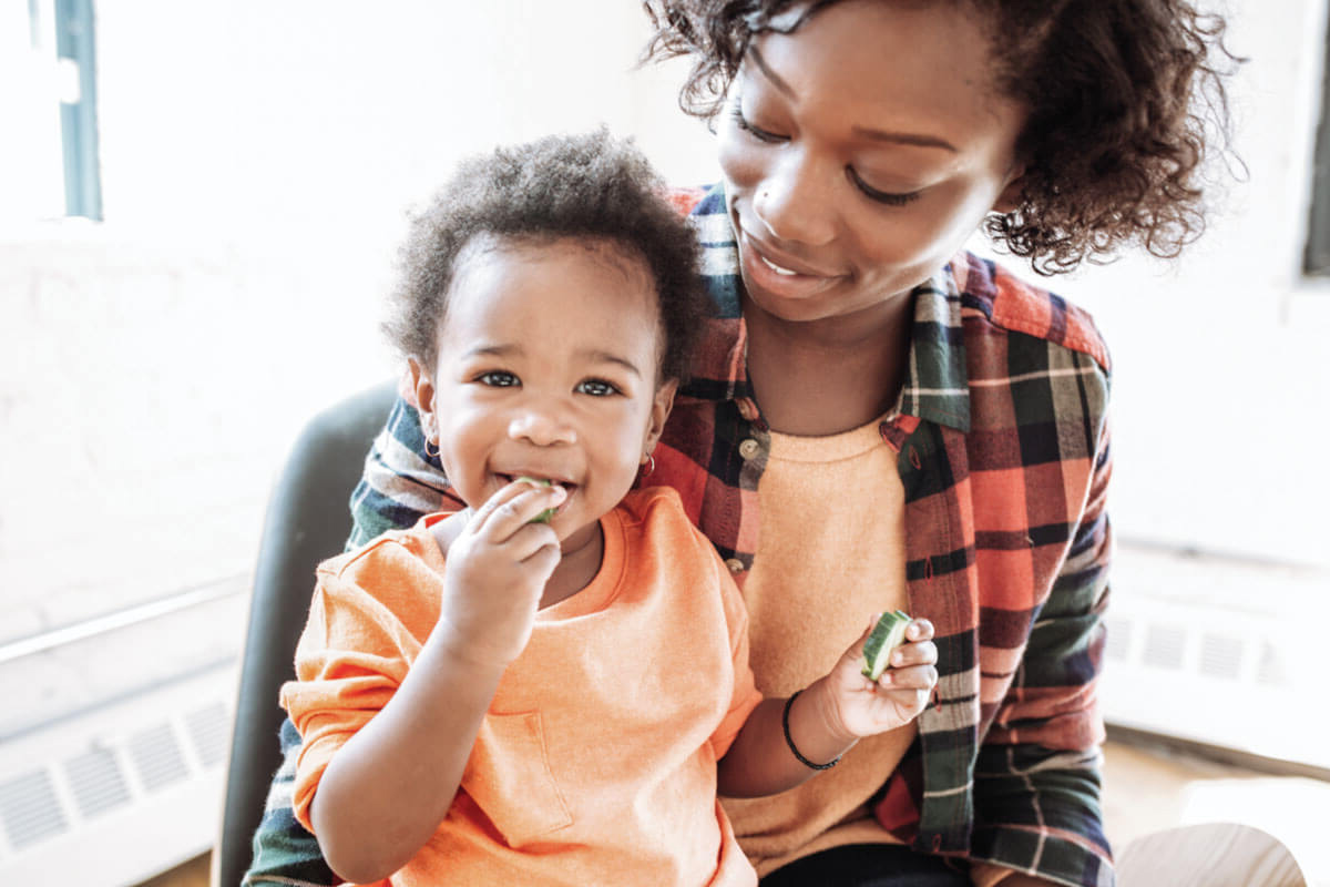 Baby Eating Veg Image