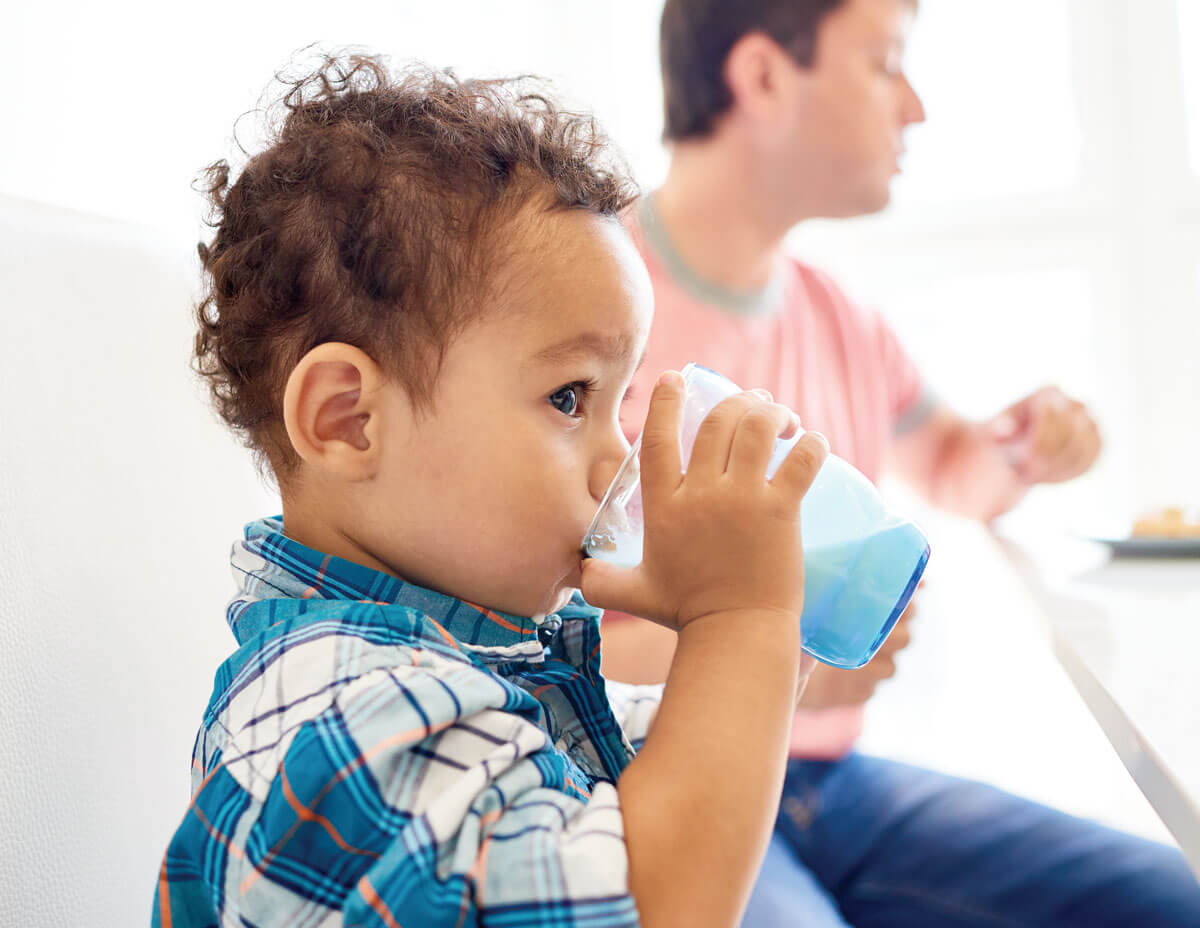 Boy drinking milk image