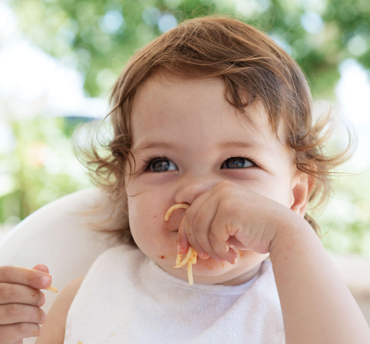 Baby girl eating image