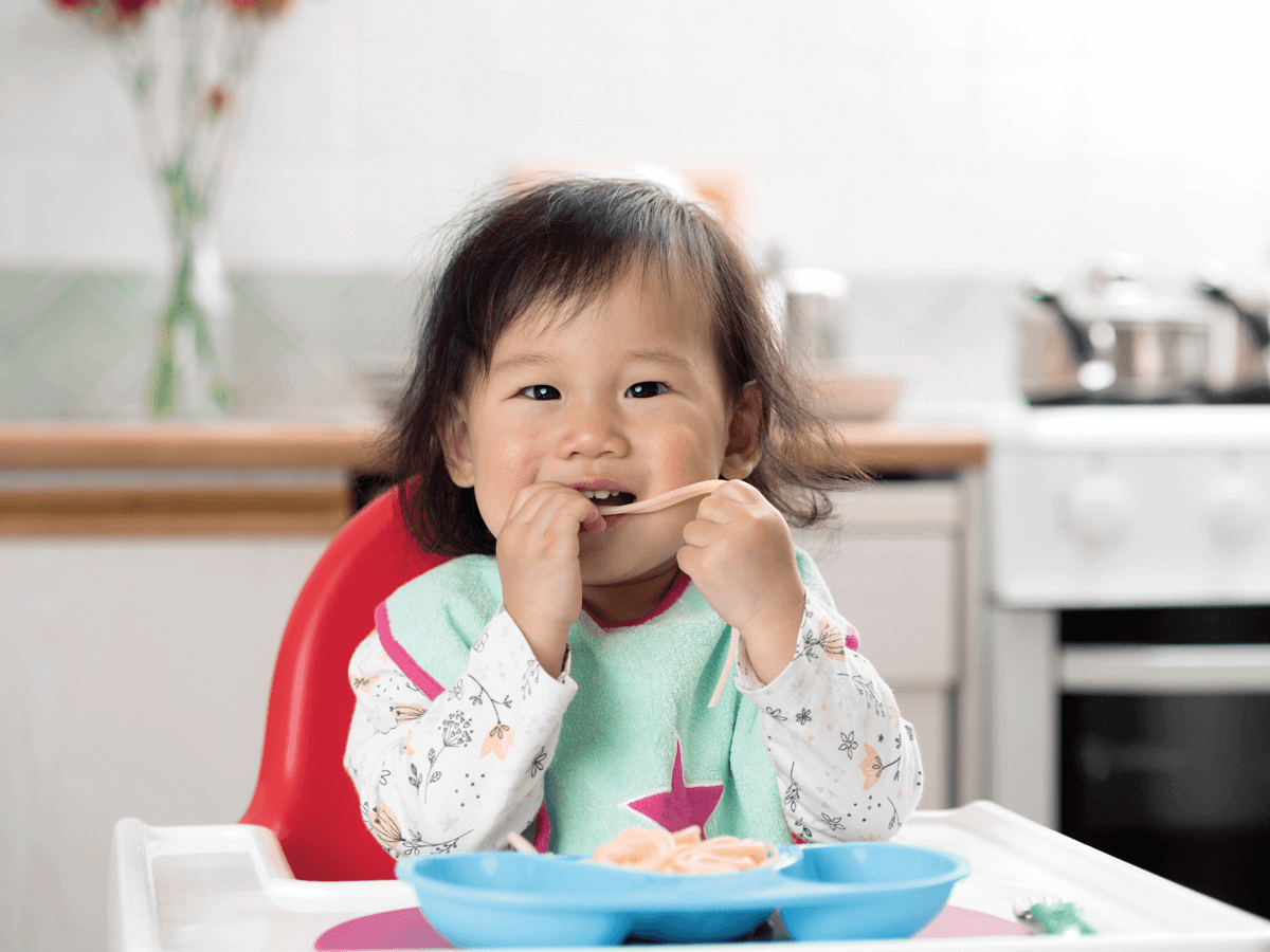 Baby girl eating img