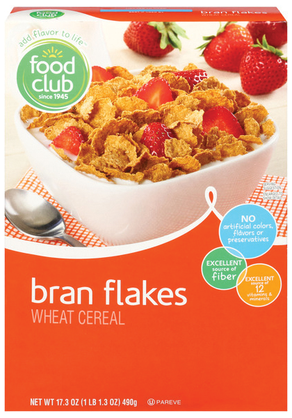 Cereal box with bowl of bran flakes and strawberries.