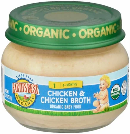 Organic baby food jar, chicken flavor, green lid.