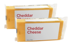 Two blocks of packaged cheddar cheese displayed.